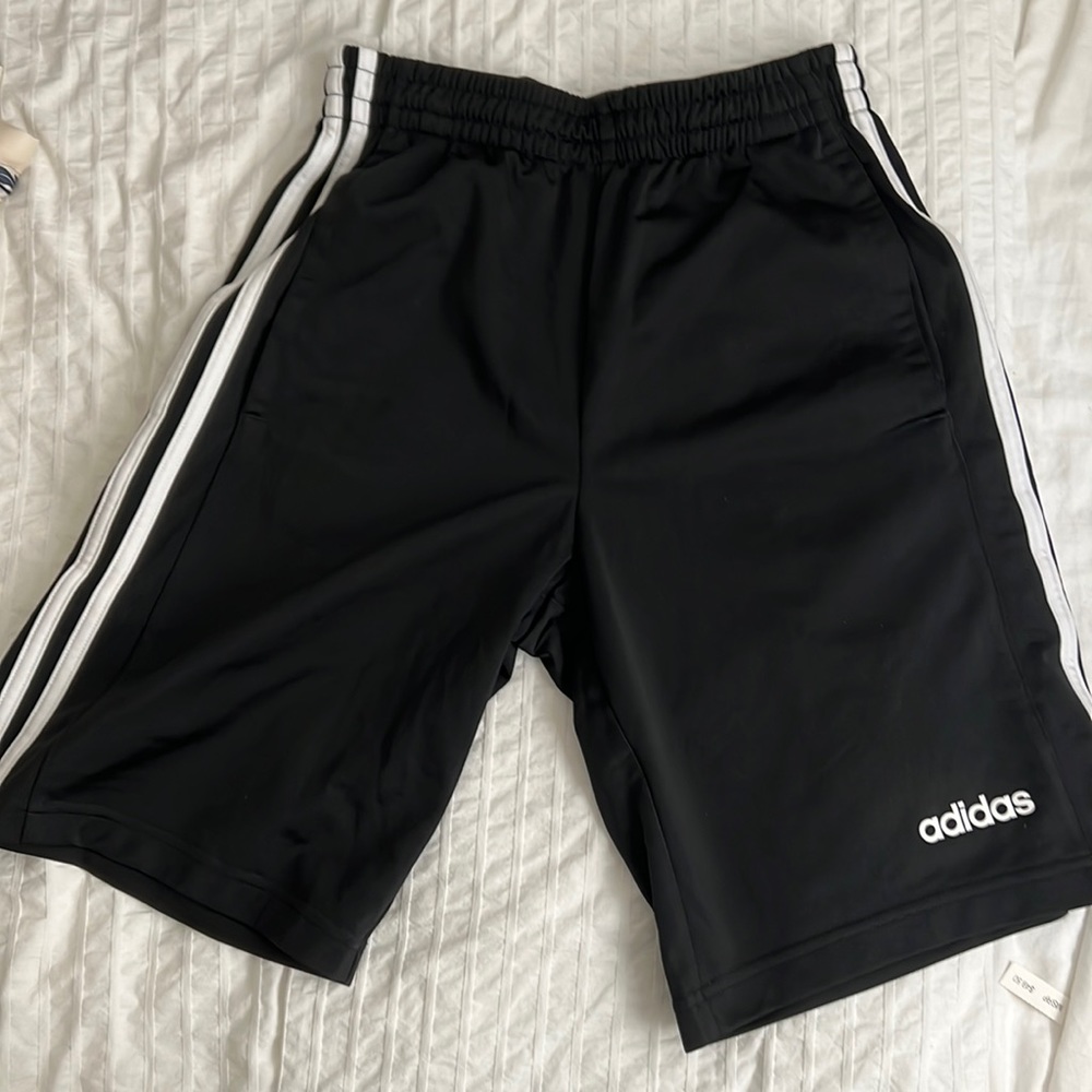 Black adidas striped shorts with pockets